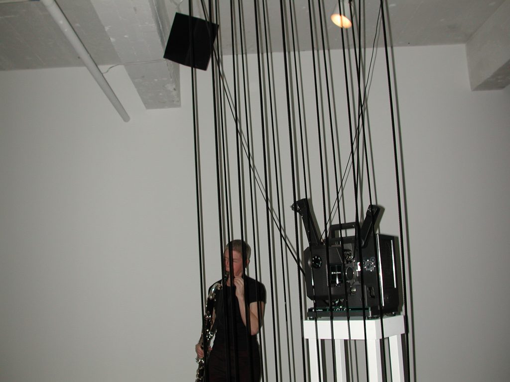 Quartet for the Year 4698 or 5760: improvisations for 4 film projectors